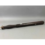 A 20TH CENTURY TRUNCHEON