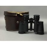 A PAIR OF BINOCULARS, STAMP ALBUMS, CAR BADGES AND OTHER OBJECTS