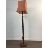 AN EASTERN CARVED WOOD STANDARD LAMP AND ANOTHER