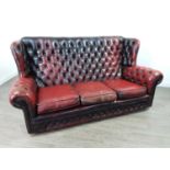 A CHESTERFIELD-STYLE OXBLOOD THREE-PIECE SUITE