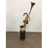 A CERAMIC STICK STAND, STICKS AND A HUNTING HORN