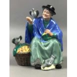 A ROYAL DOULTON FIGURE OF 'TUPPENCE A BAG' AND THREE OTHERS