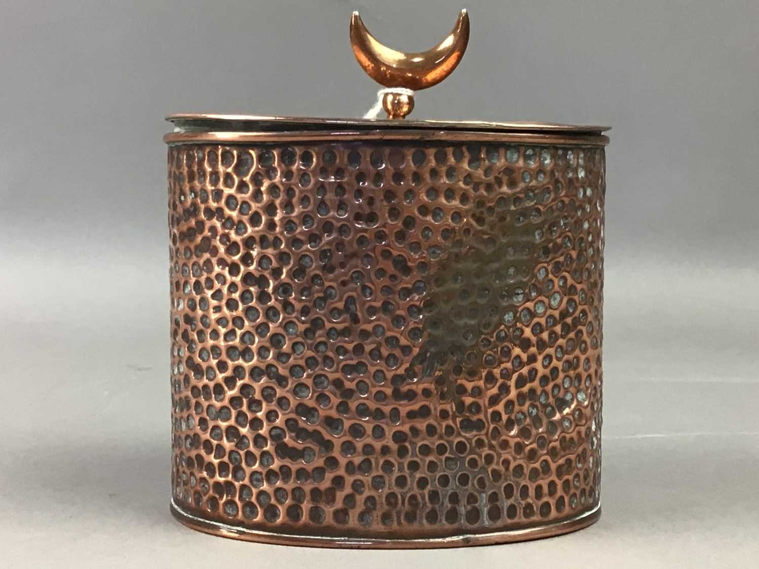 A HAMMERED COPPER TEA CADDY AND OTHER BRASS WARE