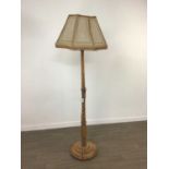 A 20TH CENTURY MAHOGANY STANDARD LAMP