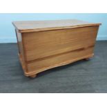 A MODERN PINE EFFECT BLANKET CHEST