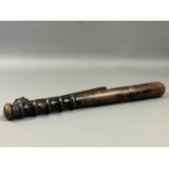 A POLICE TRUNCHEON