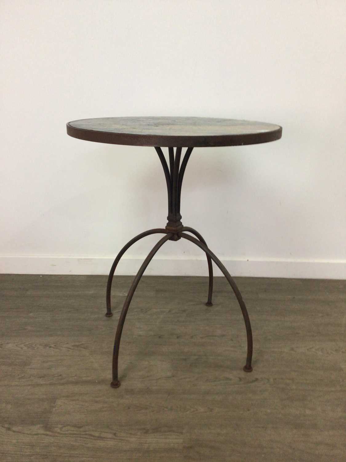 A METAL CIRCULAR GARDEN TABLE