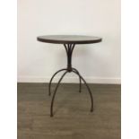 A METAL CIRCULAR GARDEN TABLE