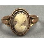NINE CARAT GOLD CAMEO RING, ANOTHER RING AND TWO CAMEOS