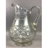 A LARGE GLASS JUG, DECANTERS AND OTHER GLASS WARE