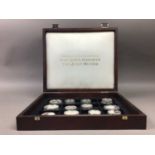 A CASED SET OF SILVER COMMEMORATIVE COINS