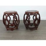 A PAIR OF CHINESE OPEN BARREL SHAPED VERANDAH SEATS