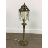 AN EARLY 20TH CENTURY BRASS TABLE LAMP