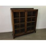 A MAHOGANY TWO DOOR BOOKCASE