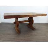 A SOLID PINE REFECTORY STYLE DINING TABLE AND FOUR CHAIRS