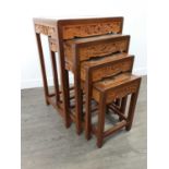 A CHINESE CARVED NEST OF FOUR TABLES
