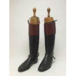 A PAIR OF VINTAGE LEATHER RIDING BOOTS WITH SHOE TREES