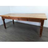 A LARGE PINE FARMHOUSE DINING TABLE