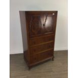 AN EARLY 20TH CENTURY WALNUT CUPBOARD CHEST