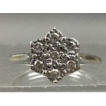 A DIAMOND FLOWER CLUSTER RING