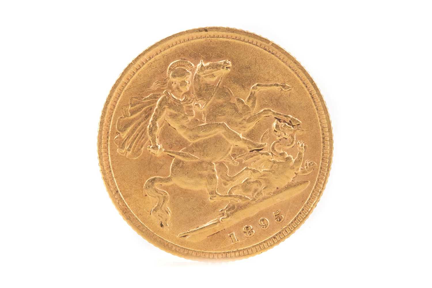 A VICTORIA GOLD HALF SOVEREIGN DATED 1895