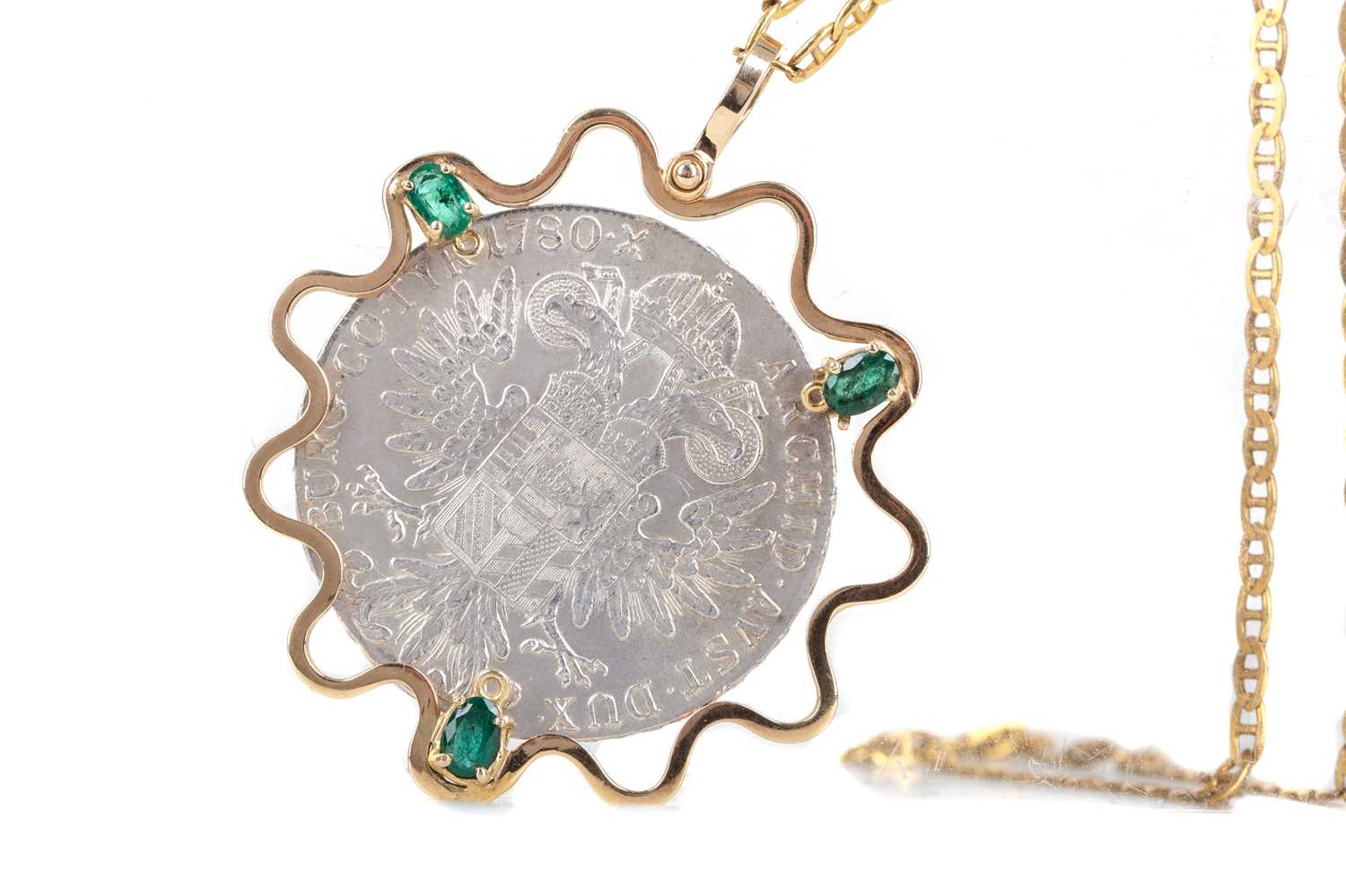 A SILVER MARIA THERESA THALER COIN PENDANT DATED 1780