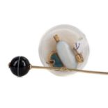 AN AGATE STICK PIN AND A COLLECTION OF PENDANTS