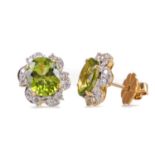 A PAIR OF PERIDOT AND DIAMOND EARRINGS