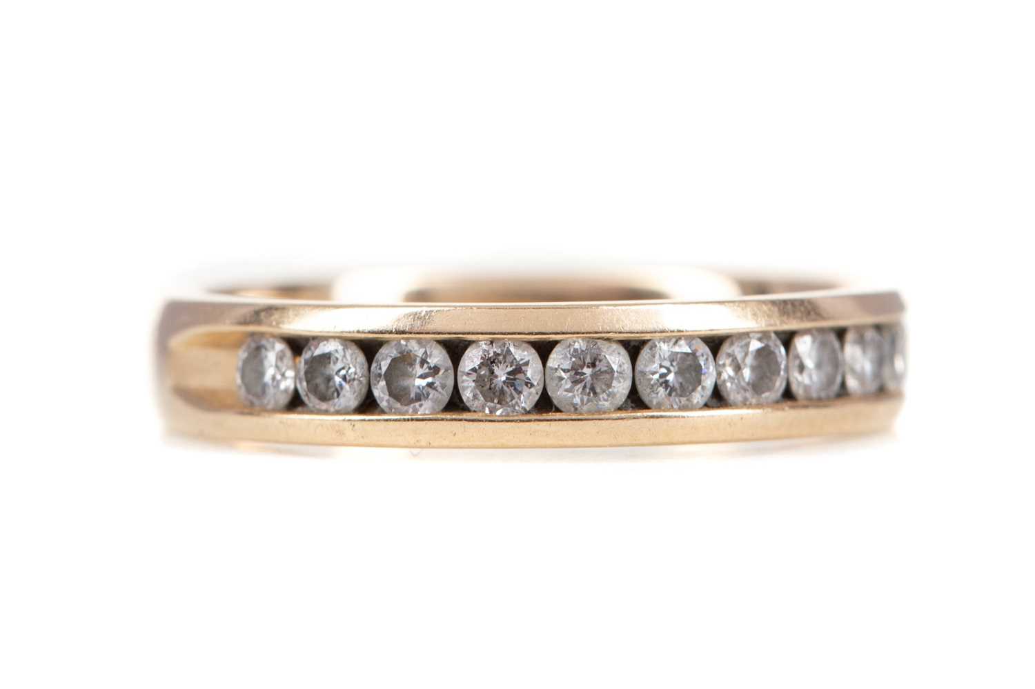 A DIAMOND HALF ETERNITY RING