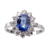 A SAPPHIRE AND DIAMOND RING