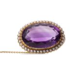 AN AMETHYST AND PEARL BROOCH