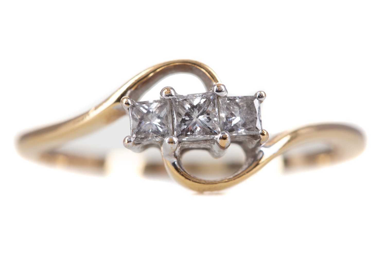 A DIAMOND THREE STONE RING