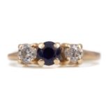 A SAPPHIRE AND DIAMOND THREE STONE RING