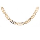 A NINE CARAT GOLD GREEK KEY PATTERN NECKLACE