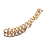 A NINE CARAT GOLD CURB LINK BRACELET