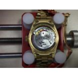 A LADY'S ROLEX OYSTER PERPETUAL DATEJUST EIGHTEEN CARAT GOLD AUTOMATIC WRIST WATCH