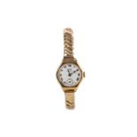 A LADY'S TISSOT NINE CARAT GOLD MANUAL WIND WRIST WATCH