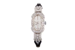 A LADY'S INCABLOC PLATINUM AND DIAMOND MANUAL WIND COCKTAIL WATCH