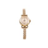 A LADY'S OMEGA NINE CARAT GOLD MANUAL WIND WRIST WATCH