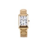 A GENTLEMAN'S MAURICE LACROIX EIGHTEEN CARAT GOLD QUARTZ WRIST WATCH