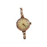 A LADY'S NINE CARAT GOLD MANUAL WIND WRIST WATCH