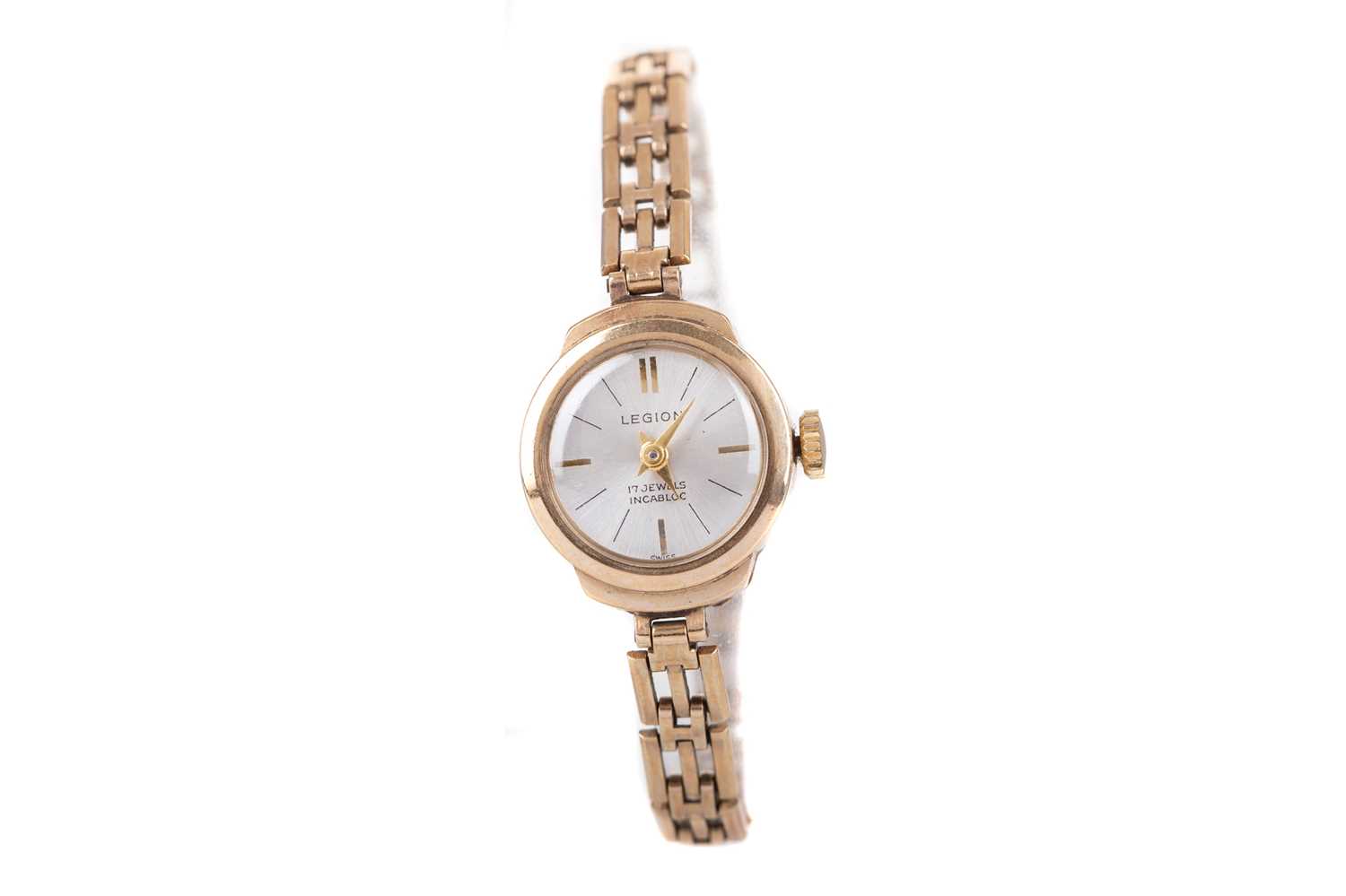 A LADY'S LEGION NINE CARAT GOLD MANUAL WIND WRIST WATCH