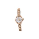 A LADY'S LEGION NINE CARAT GOLD MANUAL WIND WRIST WATCH