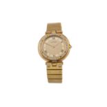 A LADY'S CARTIER RONDE EIGHTEEN CARAT GOLD QUARTZ WRIST WATCH