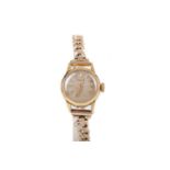 A LADY'S TURLER GOLD MANUAL WIND WRIST WATCH