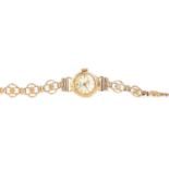 A LADY'S SEIKO NINE CARAT GOLD MANUAL WIND WRIST WATCH