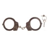 A PAIR OF SMITH & WESSON HANDCUFFS