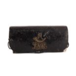 A LATE 19TH/EARLY 20TH CENTURY LEATHER CASED AMMUNITION POUCH