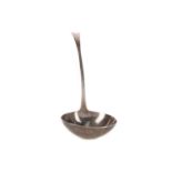 A 19TH CENTURY WHITE METAL SAUCE LADLE