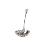 A GEORGE III IRISH SILVER SOUP LADLE